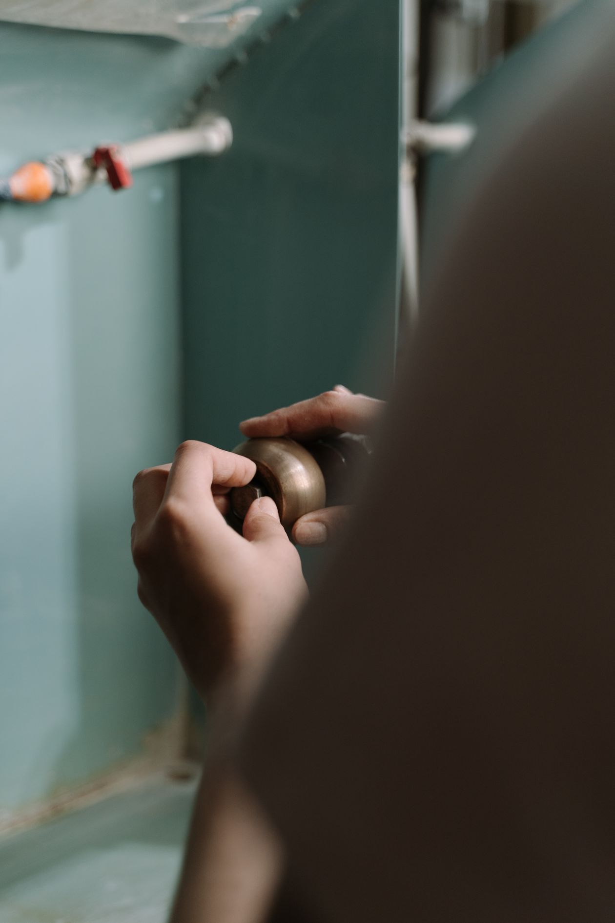 Plumber repairing a sink